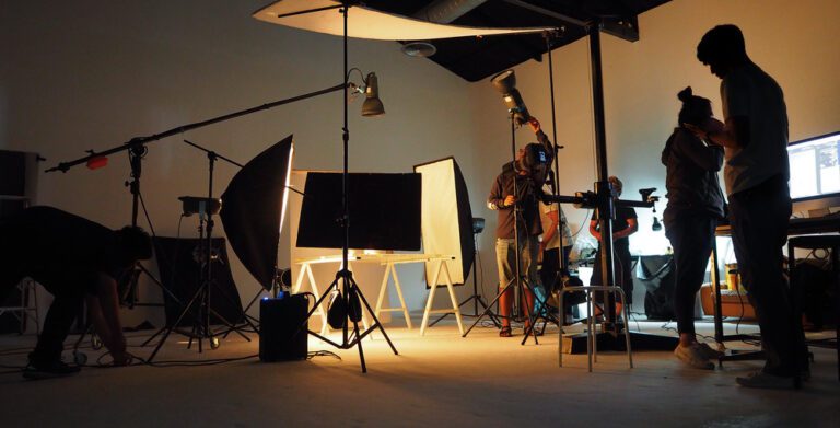 A behind-the-scenes shot of a Charleston photographer at work